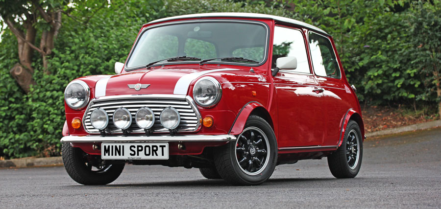 Red Mini Cooper, with Black Mini Wheels