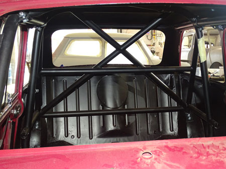 Install of a roll cage, at Mini Sport's Body Shop