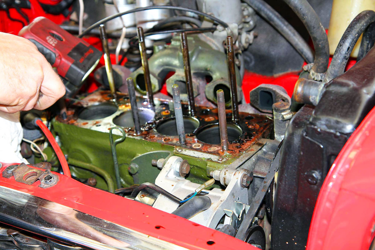 Inspection of the Head Gasket in a classic Mini.