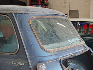 Classic Mini rear window and roof rust and damage