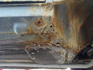 Rust showing on classic Mini front sill and wheelarch