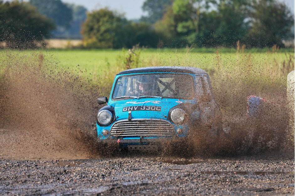 Rally Mini driving through puddle.
