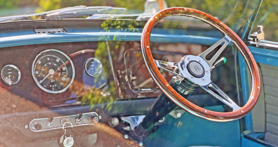 ev-interior-through-glass Interior of a Mk1 Mini EV Conversion , fitted with a Quick Release Steering Wheel