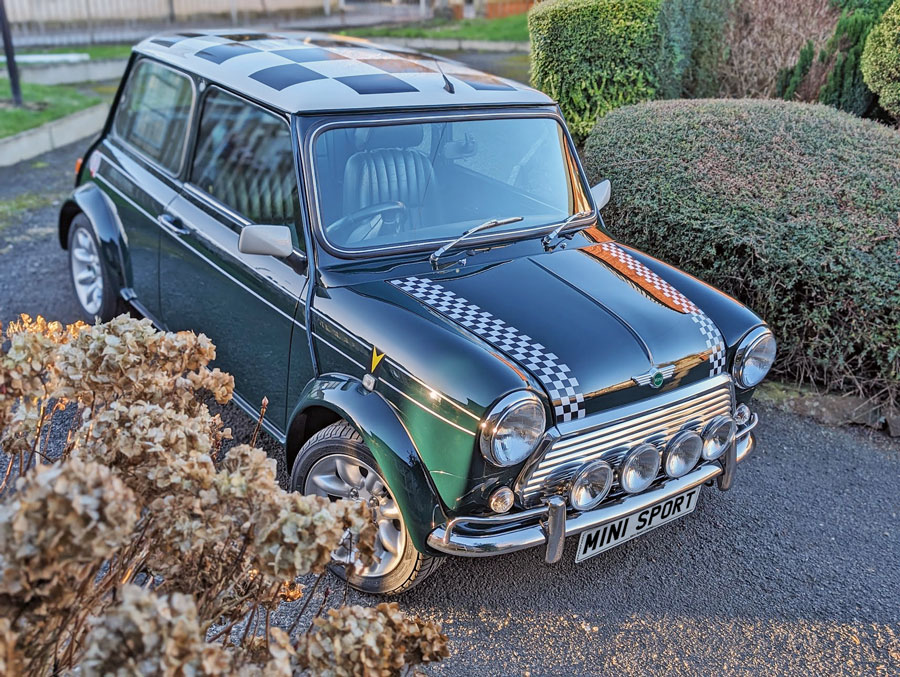 Classic Mini Cooper in Brooklands green, restored by Mini Sport Ltd, tells a mini love story of dedication and craftsmanship.