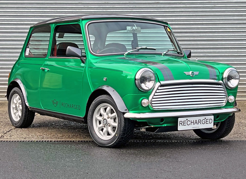 Front view of 1995 Rover Mini Cooper EV with stylish grey bonnet stripes, adding a modern touch to its classic design