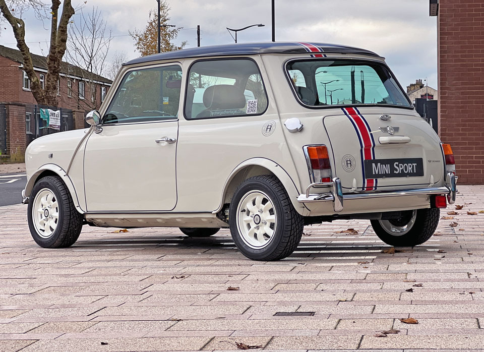 Rear view of 1999 Rover Mini Cooper 40 EV 'Merlin' in stunning white color with black roof