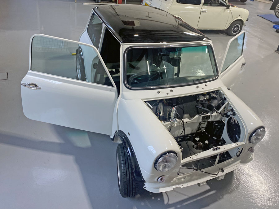 Restoration of Mrs. Barnett's Mini Cooper SPI with its newly painted shell