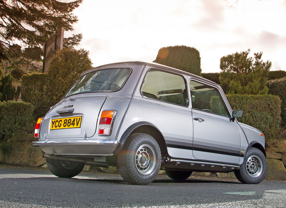 Rear view of Mini Special, highlighting its timeless silhouette and fully restored condition.