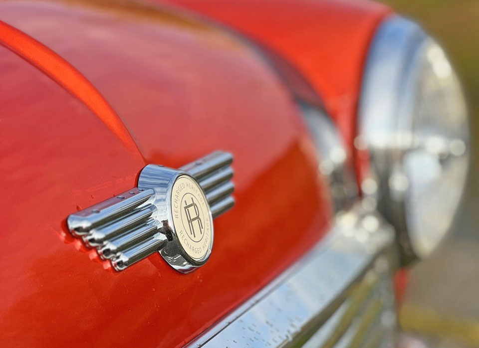 Badge on the Mini Cooper EV, representing its iconic brand and heritage.