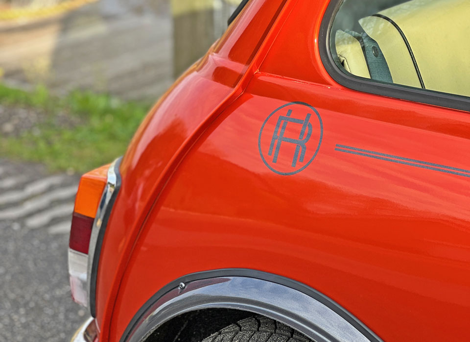 Close-up of the RHL decal on the Mini Cooper EV,