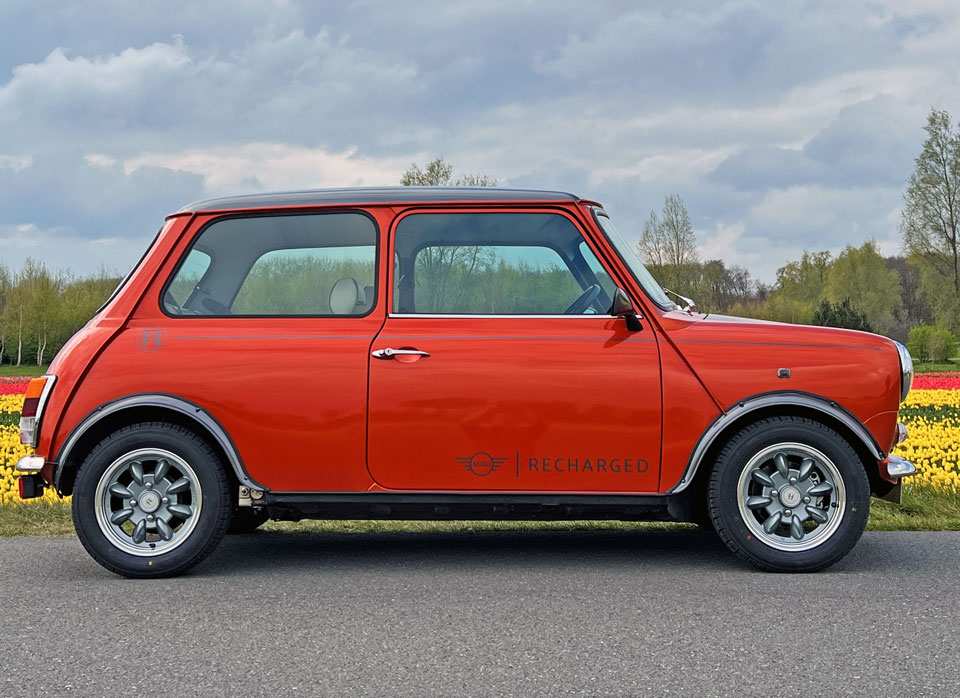 Side view of the Mini Cooper EV, showcasing its sporty profile