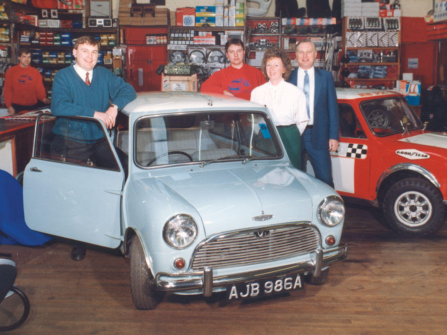 The Mini Sport Ltd, showroom, with the Harper Family.