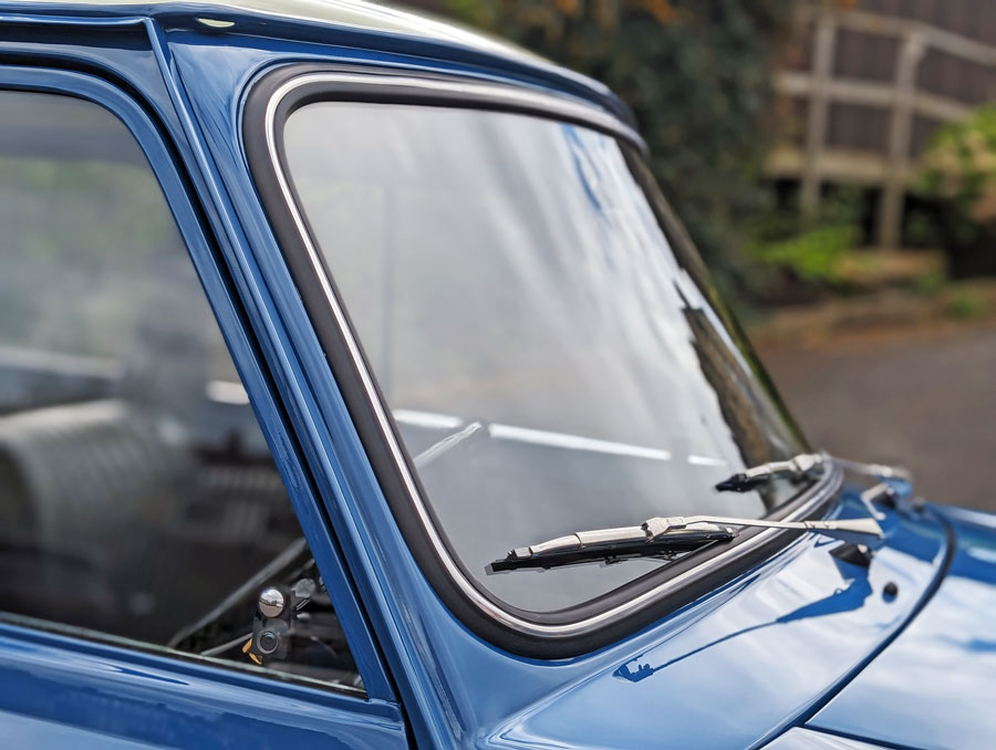 Chrome Windscreen wipers inside a Mk2 Mini Cooper, restored at Mini Sport.