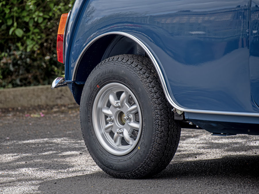 Rear Wheel and Tyre on an Island Blue Mk2 Mini Cooper.