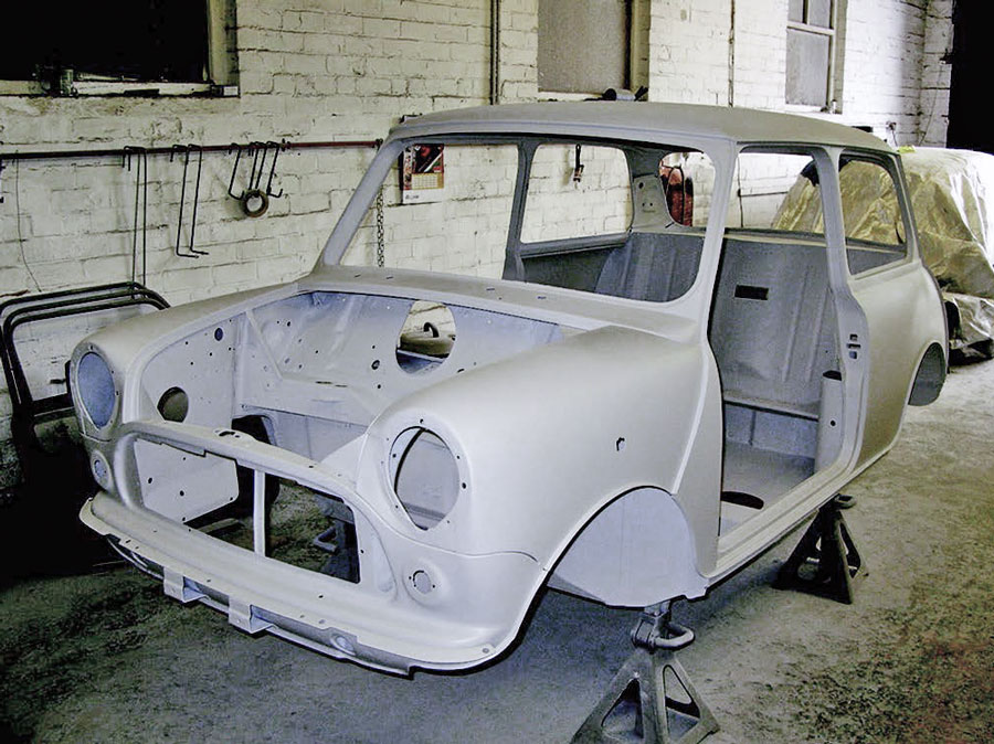Flatted Mini shell primed for painting.