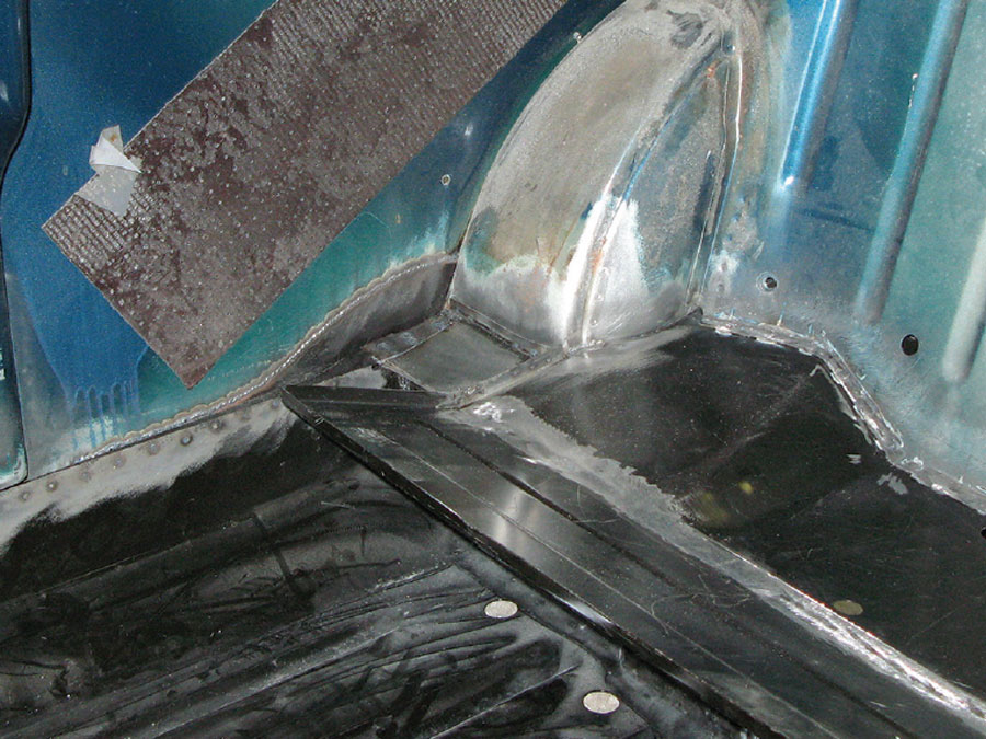 Weld penetration inspection on the inside of a repaired Mini panel.