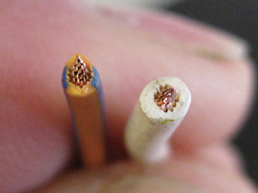 A modern thin walled wire with a thinner thick walled wire.