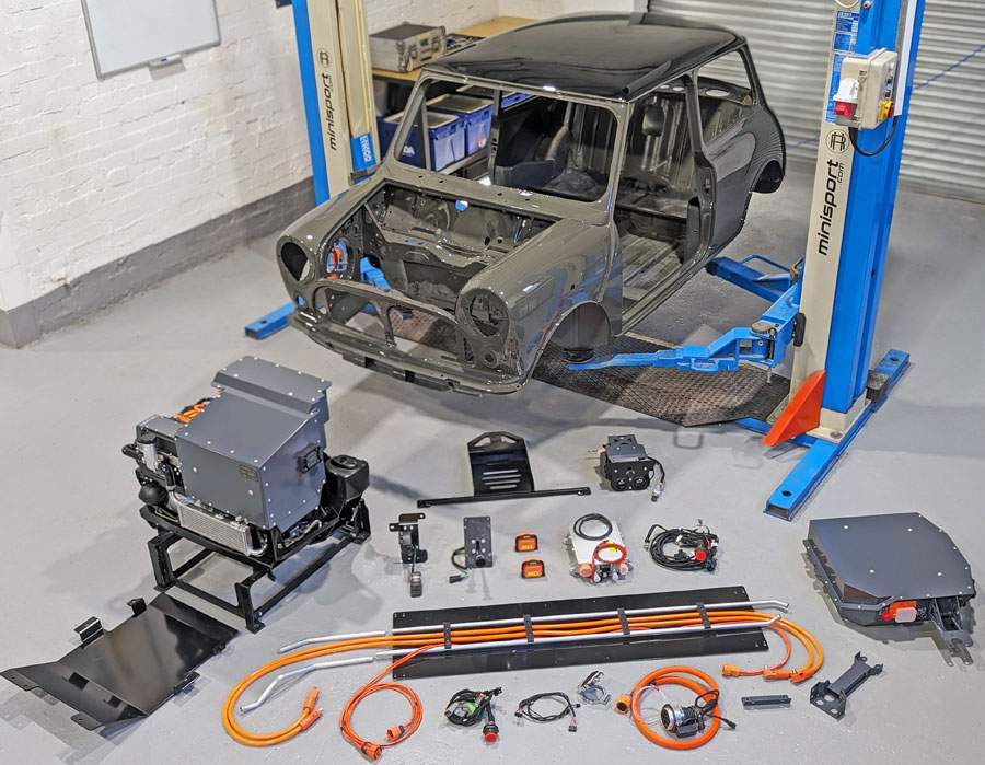 Classic Mini EV full kit by Mini Sport shown with the newly painted Yukon Grey body shell with black roof ready to fit