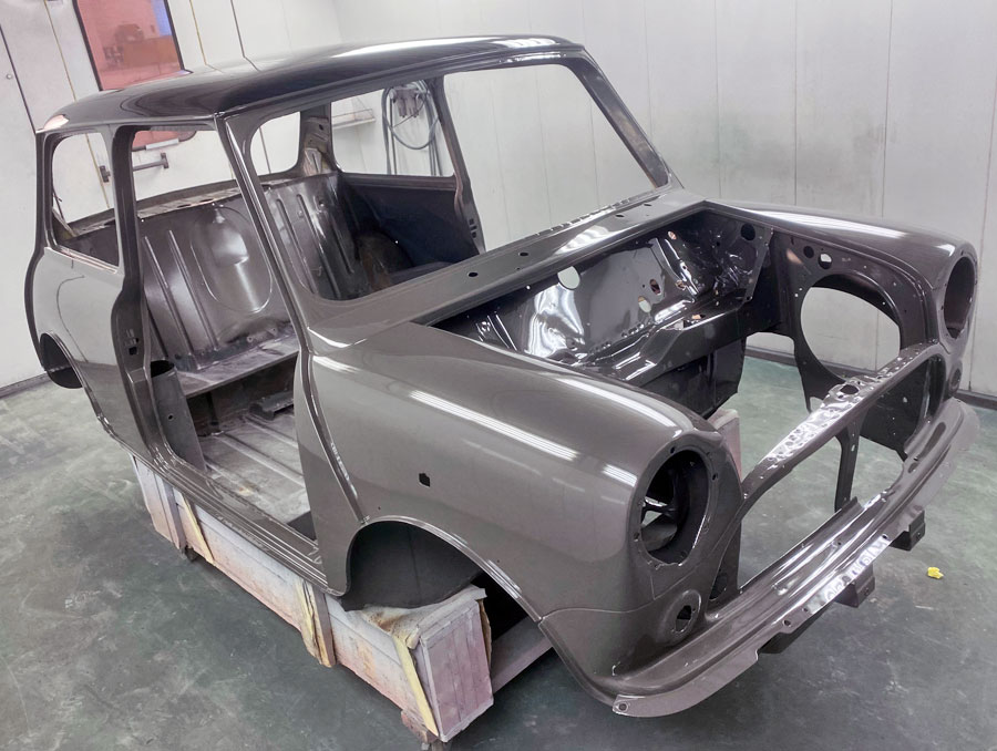 Finished painted classic Mini body shell, in Yukon Grey with contrasting black roof